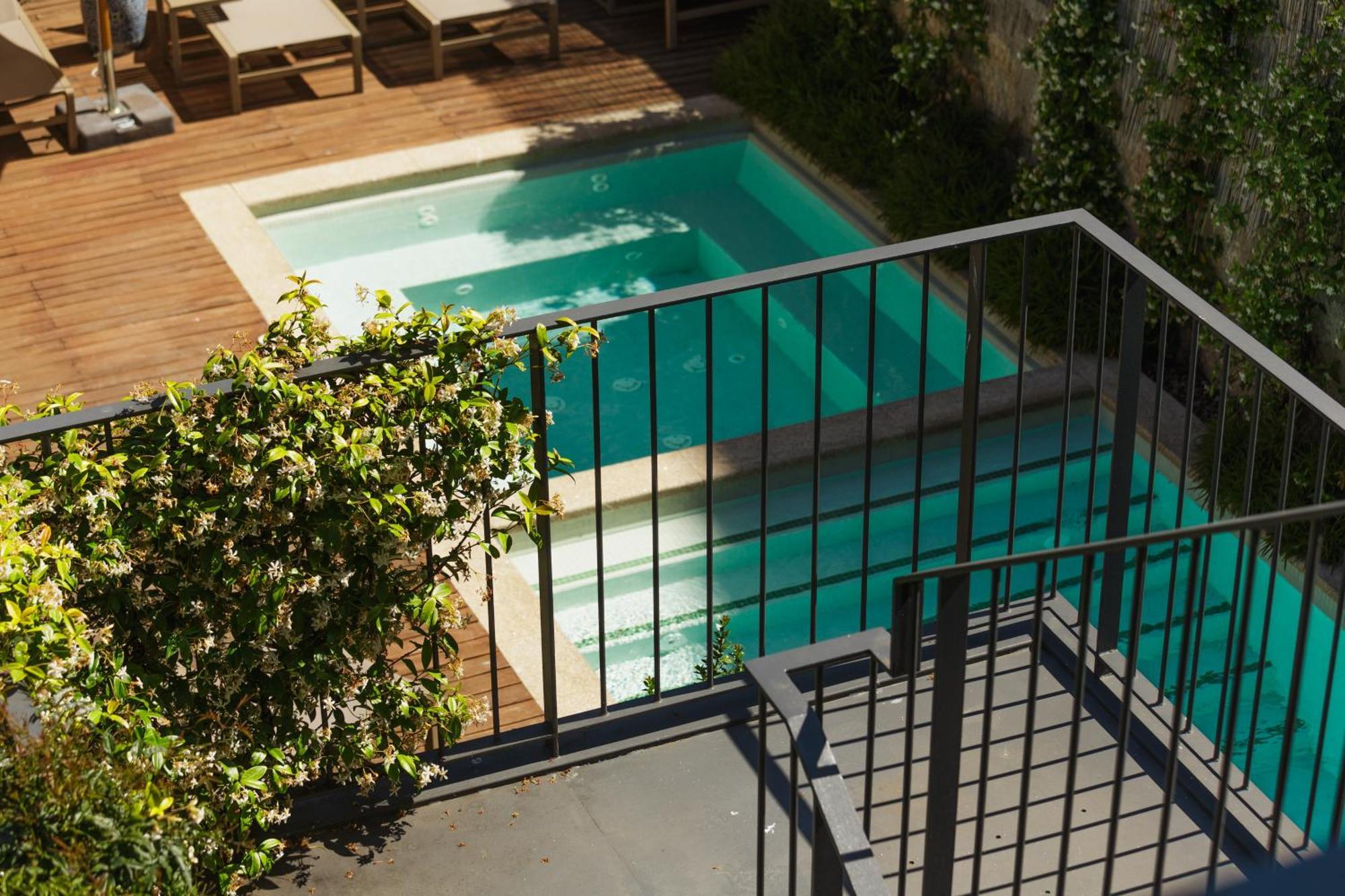 Hotel Bonjardim 560 à OOporto Extérieur photo The swimming pool at the hotel