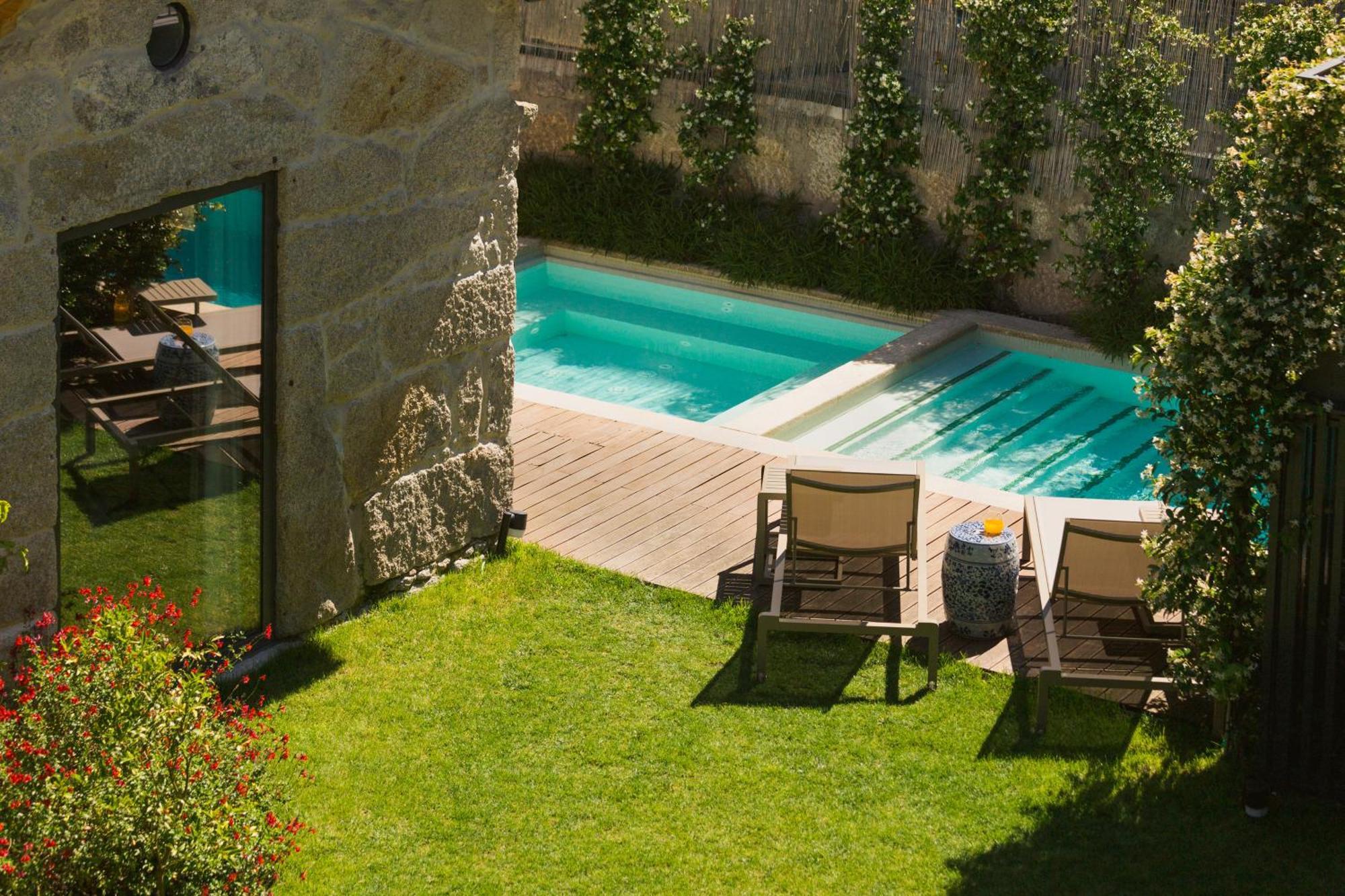 Hotel Bonjardim 560 à OOporto Extérieur photo The swimming pool at the hotel